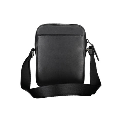 Shoulder Bag by Calvin Klein for men in polyester & polyethylene black features a stately silhouette, showcasing a secure zipper, ample external-pockets & internal-pockets, and stately shoulder-strap & adjustable-strap for a stately finish.
