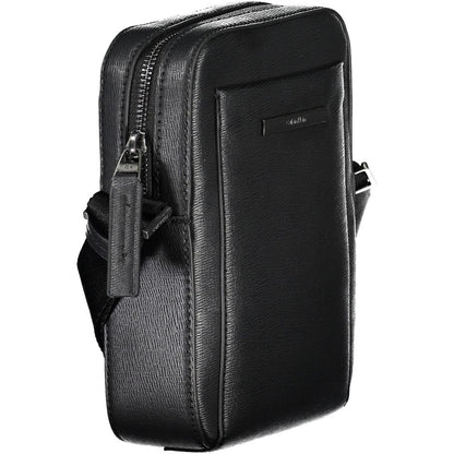 Shoulder Bag by Calvin Klein for men in polyester & polyethylene black features a statuesque silhouette, showcasing a secure zipper and statuesque external-pockets & internal-pockets with versatile shoulder-strap & adjustable-strap for a statuesque finish.