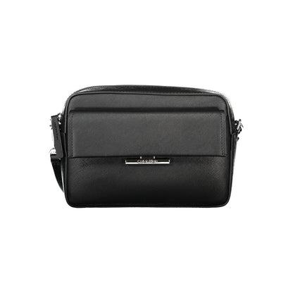 Crossbody Handbag by Calvin Klein for women in polyethylene black features a ornamental silhouette, showcasing a secure snap, ample external-pockets & internal-pockets, and ornamental crossbody-strap & adjustable-strap for a sophisticated look.