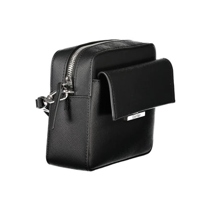 Crossbody Handbag by Calvin Klein for women in polyethylene black features a refined silhouette, showcasing a secure snap, organized external-pockets & internal-pockets, and versatile crossbody-strap & adjustable-strap for a refined finish.