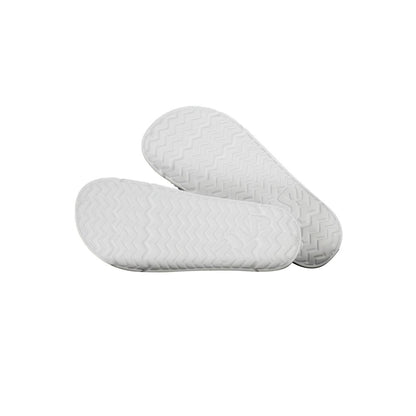 Slippers by Fila for women in polyethylene white presents a effortless silhouette, showcasing the elegant Women's Polyethylene Slippers design with its unique and sophisticated .