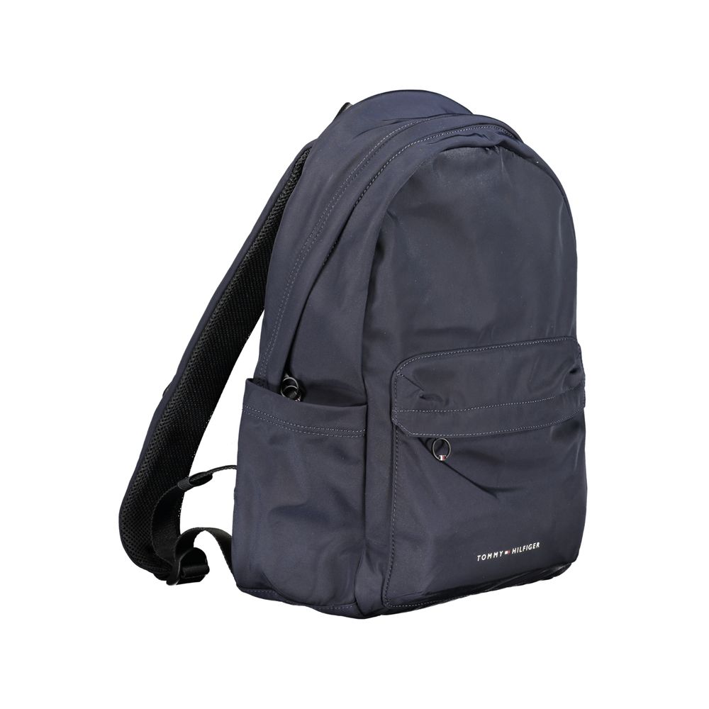 Backpack by Tommy Hilfiger for men in polyester blue & print showcases a stately Polyester Backpack design, featuring a secure zipper with stately document-holder, external-pockets & laptop-compartment and versatile backpack-strap, adjustable-strap & handle.