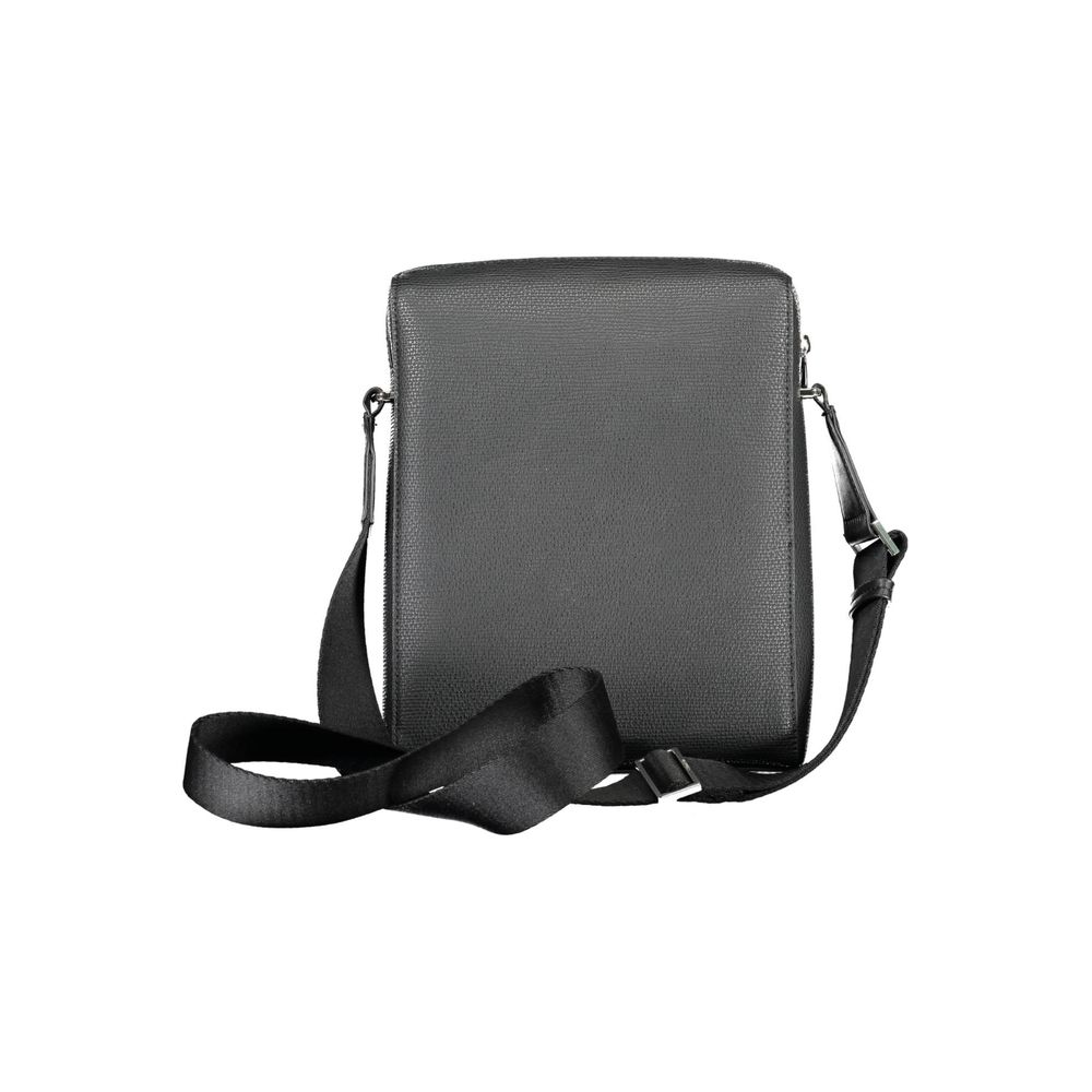 Shoulder Bag by Calvin Klein for men in polyester & polyethylene black presents a statuesque silhouette, showcasing a secure zipper and statuesque external-pockets & internal-pockets with versatile shoulder-strap & adjustable-strap for a sophisticated look.