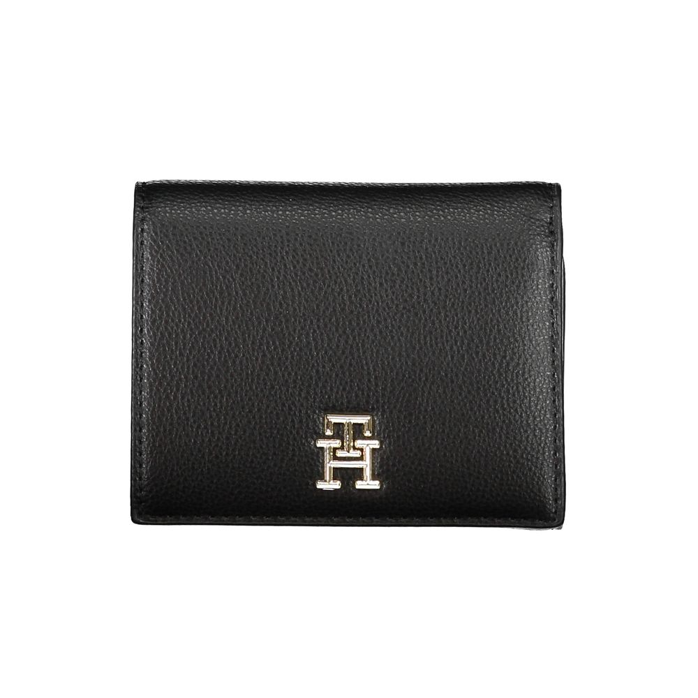 Wallet by Tommy Hilfiger for women in polyethylene black showcases a discerning silhouette, artfully capturing the essence of Polyethylene Wallet with its functional .