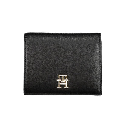 Wallet by Tommy Hilfiger for women in polyethylene black showcases a discerning silhouette, artfully capturing the essence of Polyethylene Wallet with its functional .