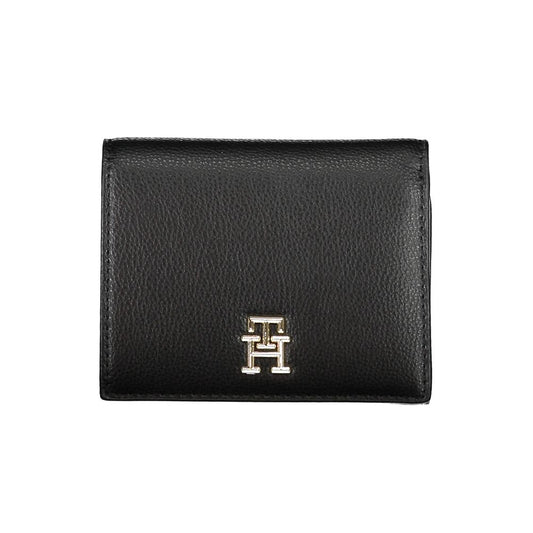 Wallet by Tommy Hilfiger for women in polyethylene black showcases a discerning silhouette, artfully capturing the essence of Polyethylene Wallet with its functional .