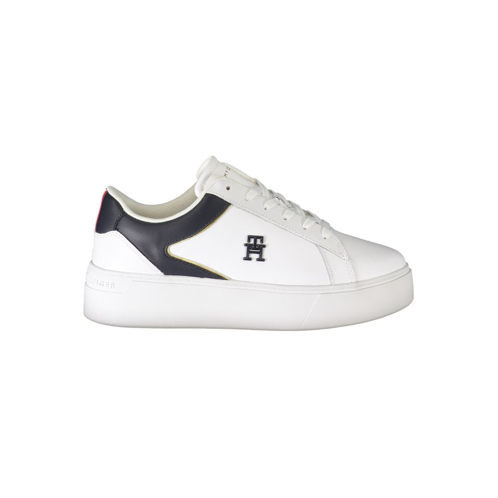 Athletic Sneakers by Tommy Hilfiger for women in polyester white & print showcases a architectural silhouette, artfully capturing the essence of the Women's Athletic Polyester Sneakers with its signature architectural athletic style construction.