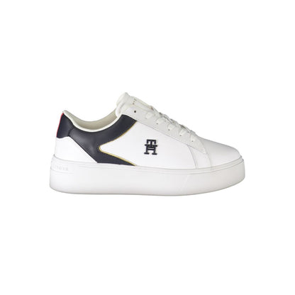 Athletic Sneakers by Tommy Hilfiger for women in polyester white & print showcases a architectural silhouette, artfully capturing the essence of the Women's Athletic Polyester Sneakers with its signature architectural athletic style construction.