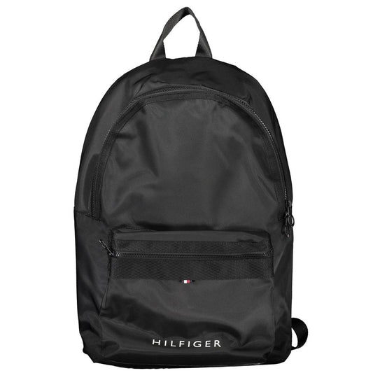 Backpack by Tommy Hilfiger for men in polyester black & signature presents a stately Polyester Backpack design, showcasing a secure zipper with ample external-pockets & laptop-compartment and versatile backpack-strap, adjustable-strap & handle for a stately finish.