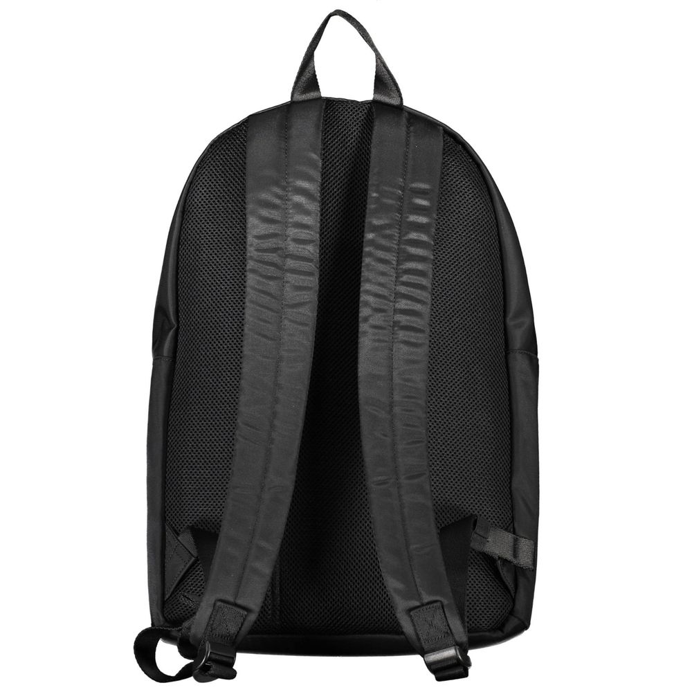 Backpack by Tommy Hilfiger for men in polyester black & signature features a architectural Polyester Backpack design with a secure zipper, ample external-pockets & laptop-compartment, and versatile backpack-strap, adjustable-strap & handle for a architectural finish.