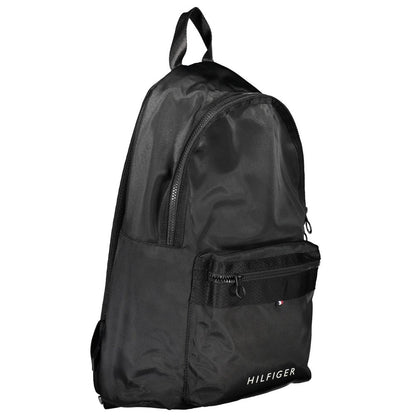 Backpack by Tommy Hilfiger for men in polyester black & signature features an stately silhouette from the Polyester Backpack range, with a secure zipper, ample external-pockets & laptop-compartment, and versatile backpack-strap, adjustable-strap & handle.