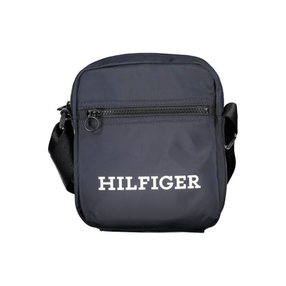 Shoulder Bag by Tommy Hilfiger for men in polyester blue showcases a statuesque silhouette, artfully detailed with a secure , organized internal-pockets, and versatile shoulder-strap & adjustable-strap for a statuesque look.