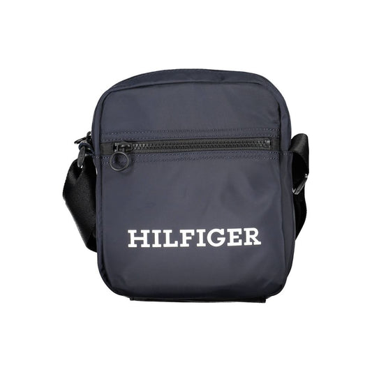Shoulder Bag by Tommy Hilfiger for men in polyester blue showcases a statuesque silhouette, artfully detailed with a secure , organized internal-pockets, and versatile shoulder-strap & adjustable-strap for a statuesque look.