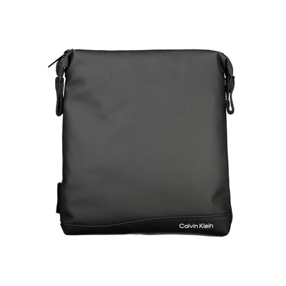 Shoulder Bag by Calvin Klein for men in polyester & polyethylene black showcases a statuesque silhouette, artfully detailed with a secure zipper, organized external-pockets & internal-pockets, and versatile shoulder-strap & adjustable-strap for a statuesque look.