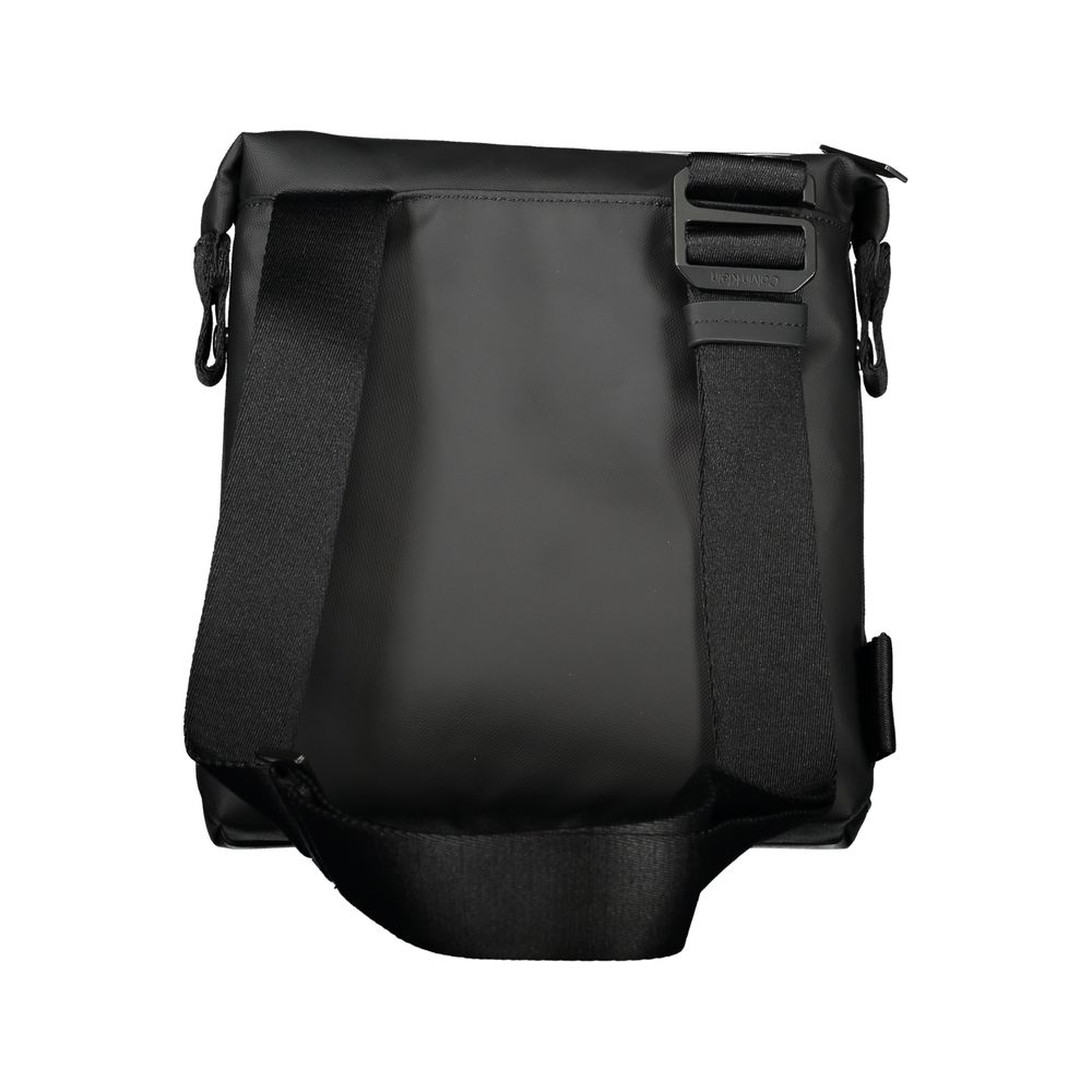 Shoulder Bag by Calvin Klein for men in polyester & polyethylene black features a effortless sophistication silhouette, secured by a zipper with ample external-pockets & internal-pockets and versatile shoulder-strap & adjustable-strap for a effortless sophistication finish.