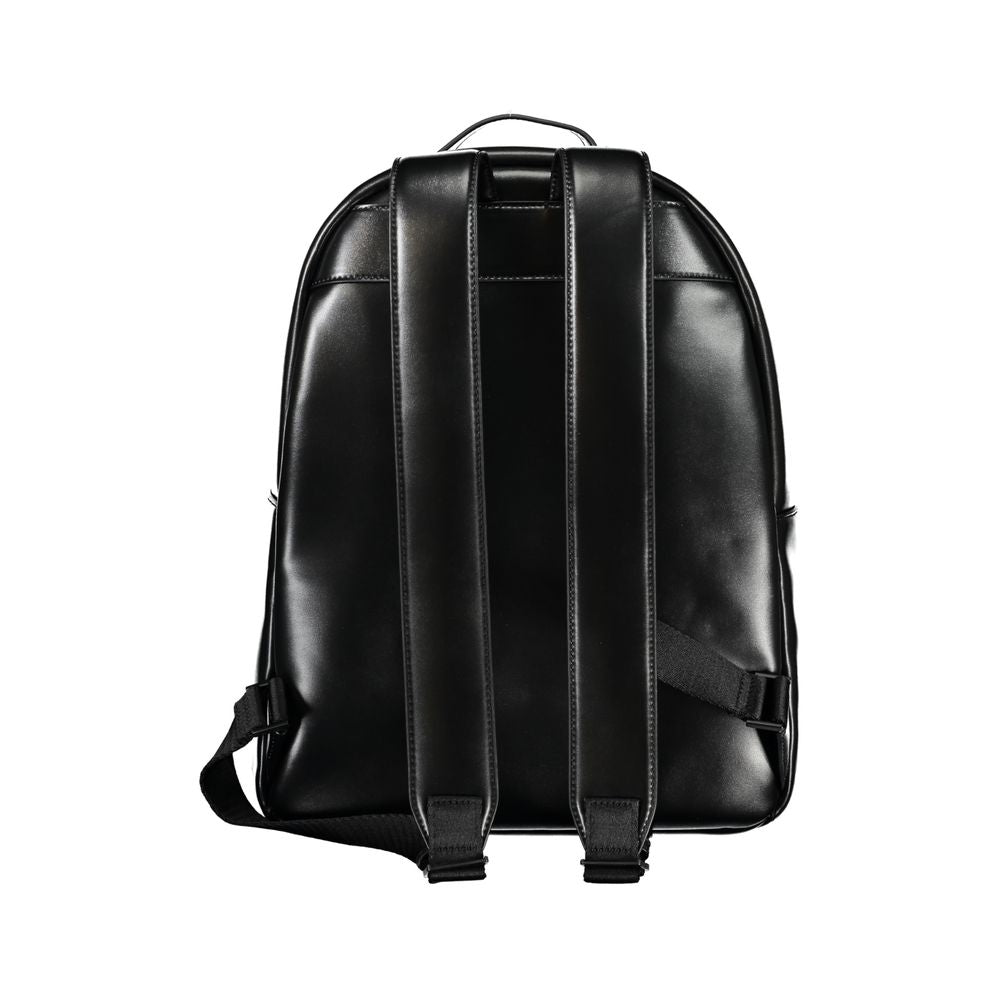 Backpack by Calvin Klein for men in polyester & polyethylene black features a stately Polyester & Polyethylene Backpack design, showcasing a secure zipper, ample built-in-compartments, external-pockets, internal-pockets & laptop-compartment, and versatile backpack-strap, adjustable-strap & handle for a stately finish.