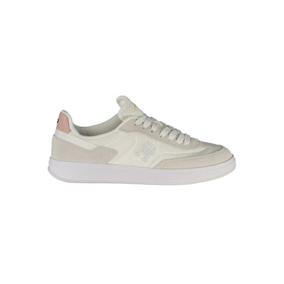 Sneakers by Tommy Hilfiger for women in polyester polyethylene leather pink & white presents a sumptuous silhouette, artfully capturing the essence of the Women's Fashion Polyester Polyethylene Leather Sneakers with its sumptuous fashion style design.