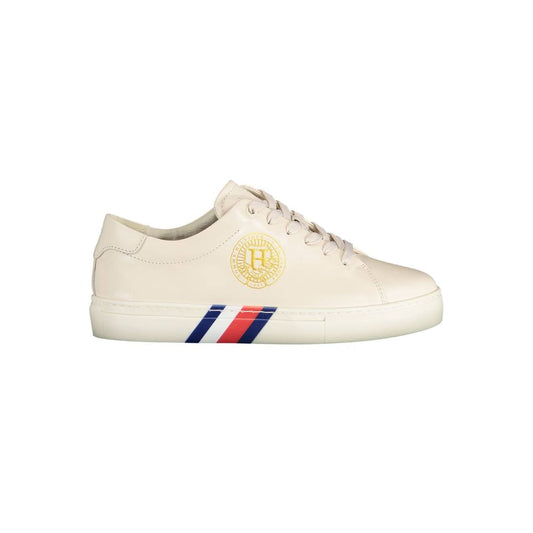 Sneakers by Tommy Hilfiger for women in organic cotton & poly leather beige presents a sumptuous silhouette as Women's Casual Organic Cotton & Poly Leather Sneakers, expertly defined by a sumptuous casual style for a sumptuous, high-fashion look.