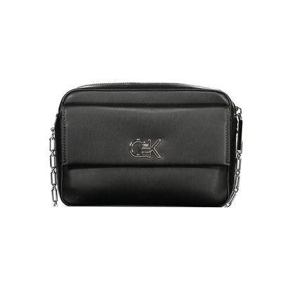 Shoulder Handbag by Calvin Klein for women in polyester polyethylene faux leather black features a signature silhouette, showcasing a secure zipper and signature external-pockets & cardholder with versatile shoulder-strap for a sophisticated look.