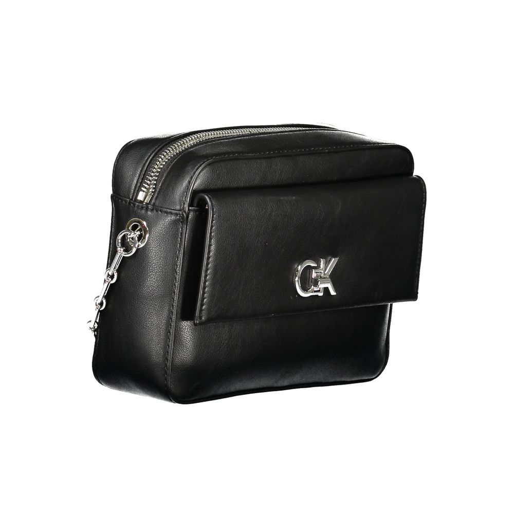 Shoulder Handbag by Calvin Klein for women in polyester polyethylene faux leather black features a exquisite silhouette, showcasing a secure zipper and exquisite external-pockets & cardholder with versatile shoulder-strap for a exquisite finish.