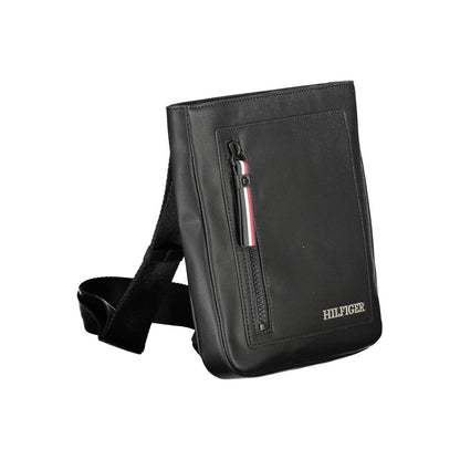 Shoulder Bag by Tommy Hilfiger for men in polyethylene black showcases a statuesque silhouette, artfully detailed with a secure zipper, organized external-pockets & internal-pockets, and versatile shoulder-strap & adjustable-strap for a statuesque look.