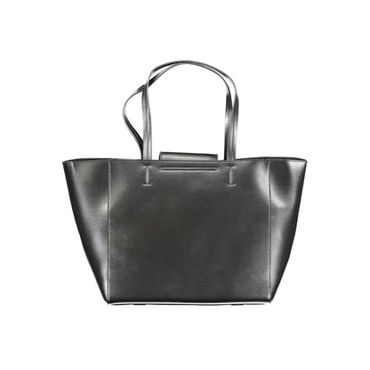 This Shopper Handbag by Calvin Klein for women in polyester faux leather and black presents a sculptural silhouette featuring a secure snap, ample internal-pockets, and versatile handle for a sculptural finish.