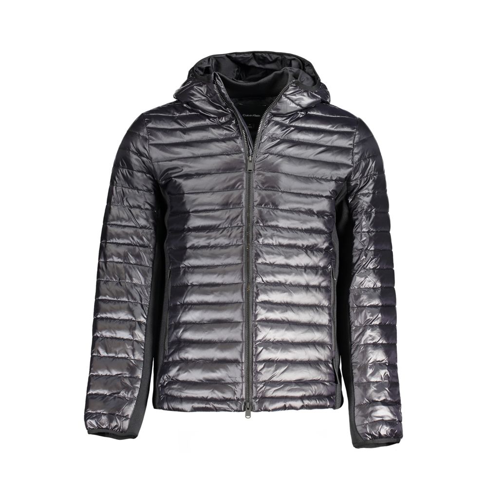 Hooded Windbreaker Jacket by Calvin Klein for men in nylon black presents a resilient silhouette, artfully detailed with a sophisticated hooded neckline and functional pockets, hooded & windproof for a resilient finish.
