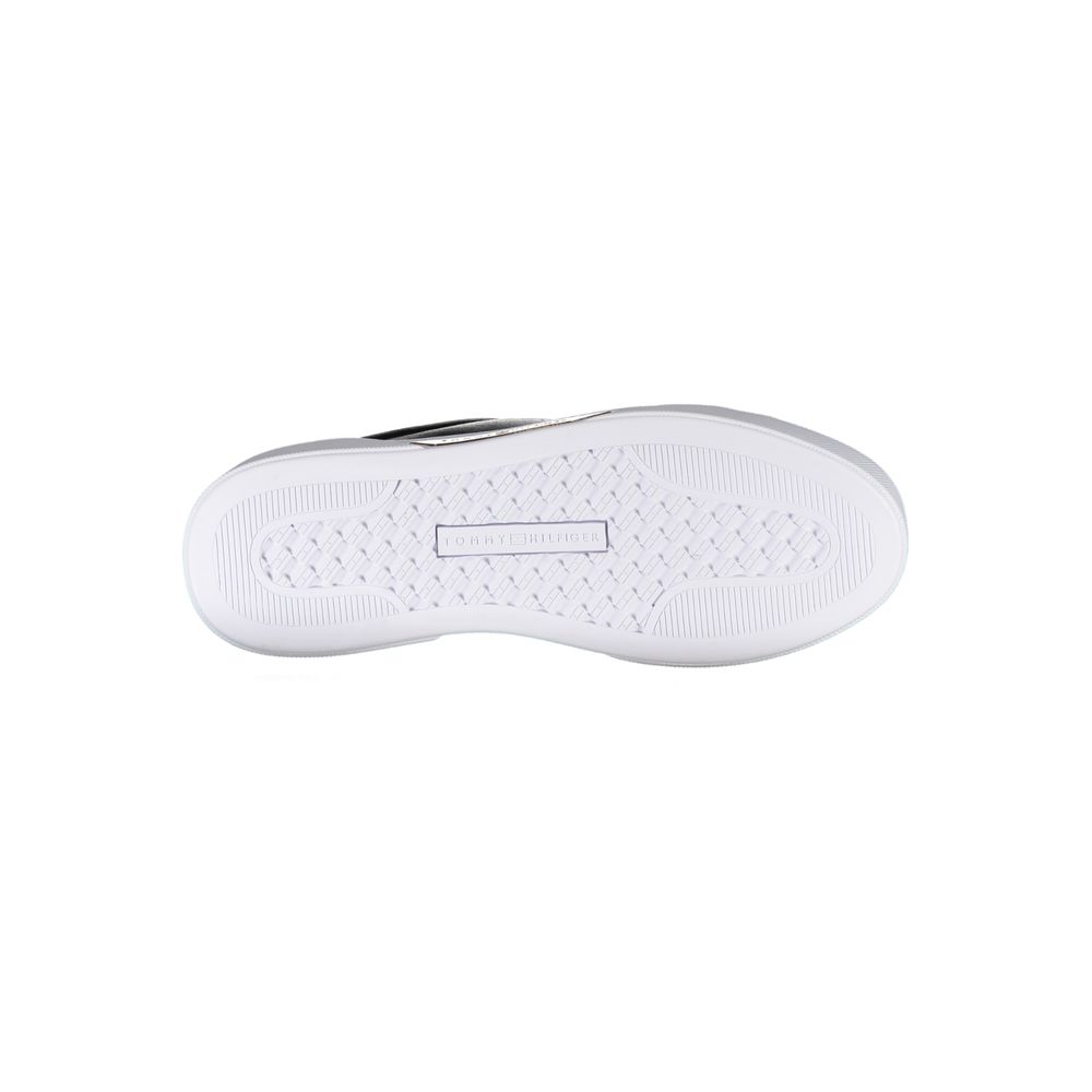 Sneakers by Tommy Hilfiger for women in polyester polyethylene leather black presents a sumptuous silhouette from the Women's Casual Polyester Polyethylene Leather Sneakers collection, showcasing a sumptuous casual style for an elevated aesthetic.