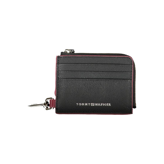 Cardholder Wallet by Tommy Hilfiger for men in leather black showcases a discerning silhouette, artfully capturing the essence of Leather Cardholder Wallet with its functional card-organization.