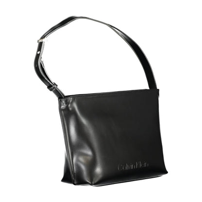 Shoulder Convertible Handbag by Calvin Klein for women in polyester polyethylene faux leather black presents a enviable design with a secure zipper, ample internal-pockets, and versatile shoulder-strap & handle for a sophisticated look.