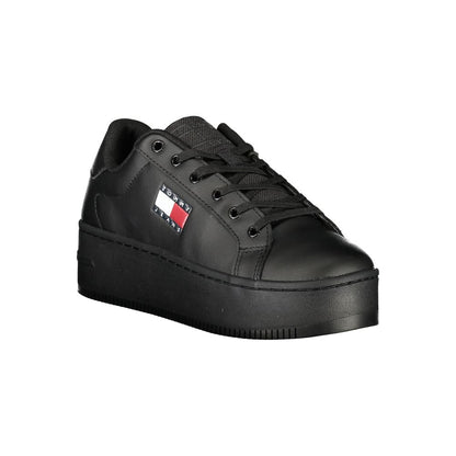Sneakers by Tommy Hilfiger for women in polyethylene polyester leather black presents a sumptuous silhouette, artfully capturing the essence of the Women's Fashion Polyethylene Polyester Leather Sneakers with its sumptuous fashion style design.