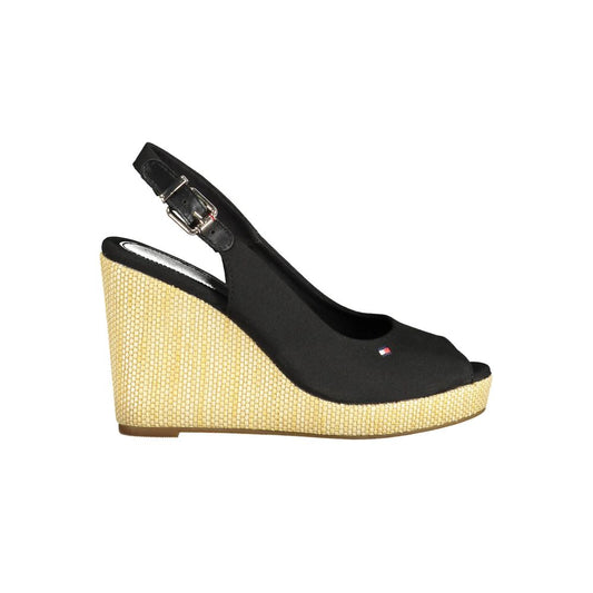 Wedge Sandals by Tommy Hilfiger for women in polyester polyethylene cotton black features an architectural design from the Women's Polyester Polyethylene Cotton Wedge Sandals collection, defined by a architectural wedge and for a architectural finish.