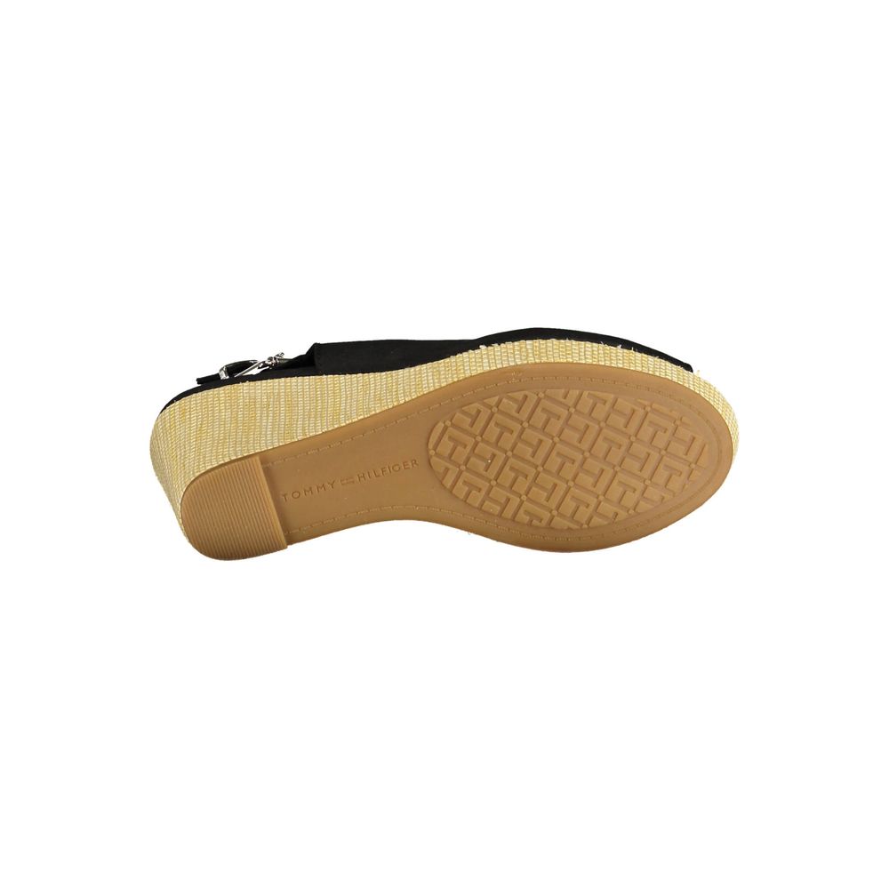 Wedge Sandals by Tommy Hilfiger for women in polyester polyethylene cotton black features an statuesque silhouette from the Women's Polyester Polyethylene Cotton Wedge Sandals collection, showcasing a statuesque wedge and elegant .