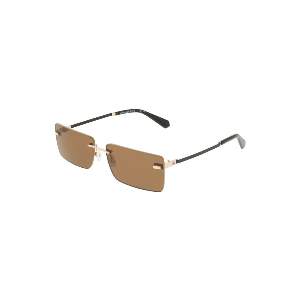 Sunglasses by Calvin Klein for women in metal beige & brown showcases a ethereal silhouette, featuring beige coloured frame with for a ethereal finish.