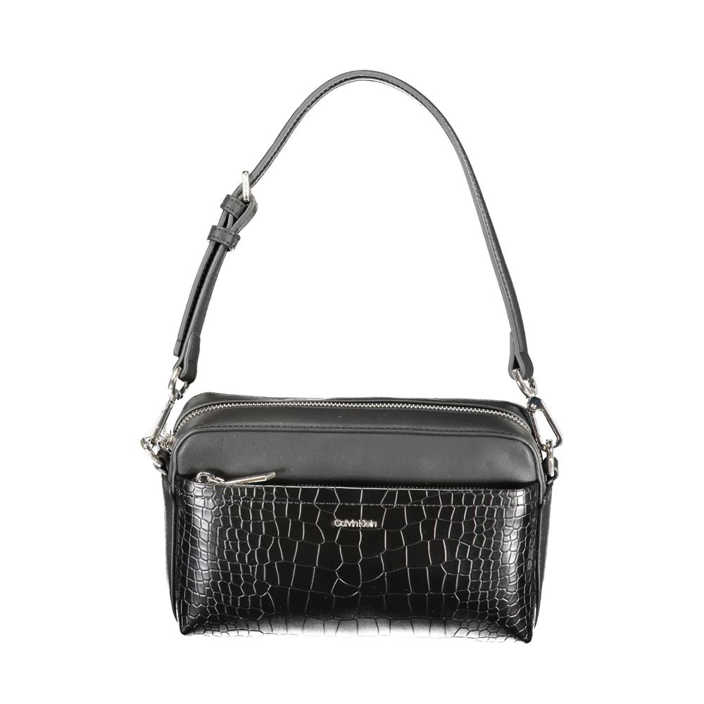 2-in-1 Shoulder & Crossbody Convertible Handbag by Calvin Klein for women in faux crocodile skin leather black features an exquisite silhouette, showcasing a secure zipper, ample external-pockets & internal-pockets, and exquisite crossbody-strap, shoulder-strap, adjustable-strap & handle for a sophisticated finish.
