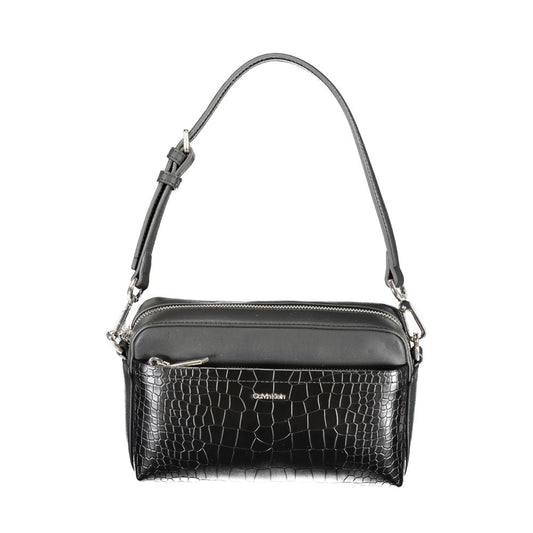 2-in-1 Shoulder & Crossbody Convertible Handbag by Calvin Klein for women in faux crocodile skin leather black features an exquisite silhouette, showcasing a secure zipper, ample external-pockets & internal-pockets, and exquisite crossbody-strap, shoulder-strap, adjustable-strap & handle for a sophisticated finish.