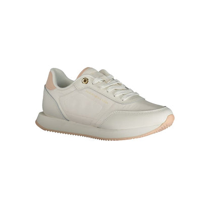 Sneakers by Tommy Hilfiger for women in polyester white features an opulent silhouette from the Women's Fashion Polyester Sneakers collection, showcasing a signature fashion style with an opulent finish.
