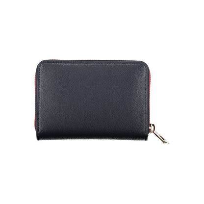 Wallet by Tommy Hilfiger for women in polyester & polyethylene blue & signature showcases a discerning silhouette, artfully capturing the essence of Polyester & Polyethylene Wallet with its functional eco-friendly.