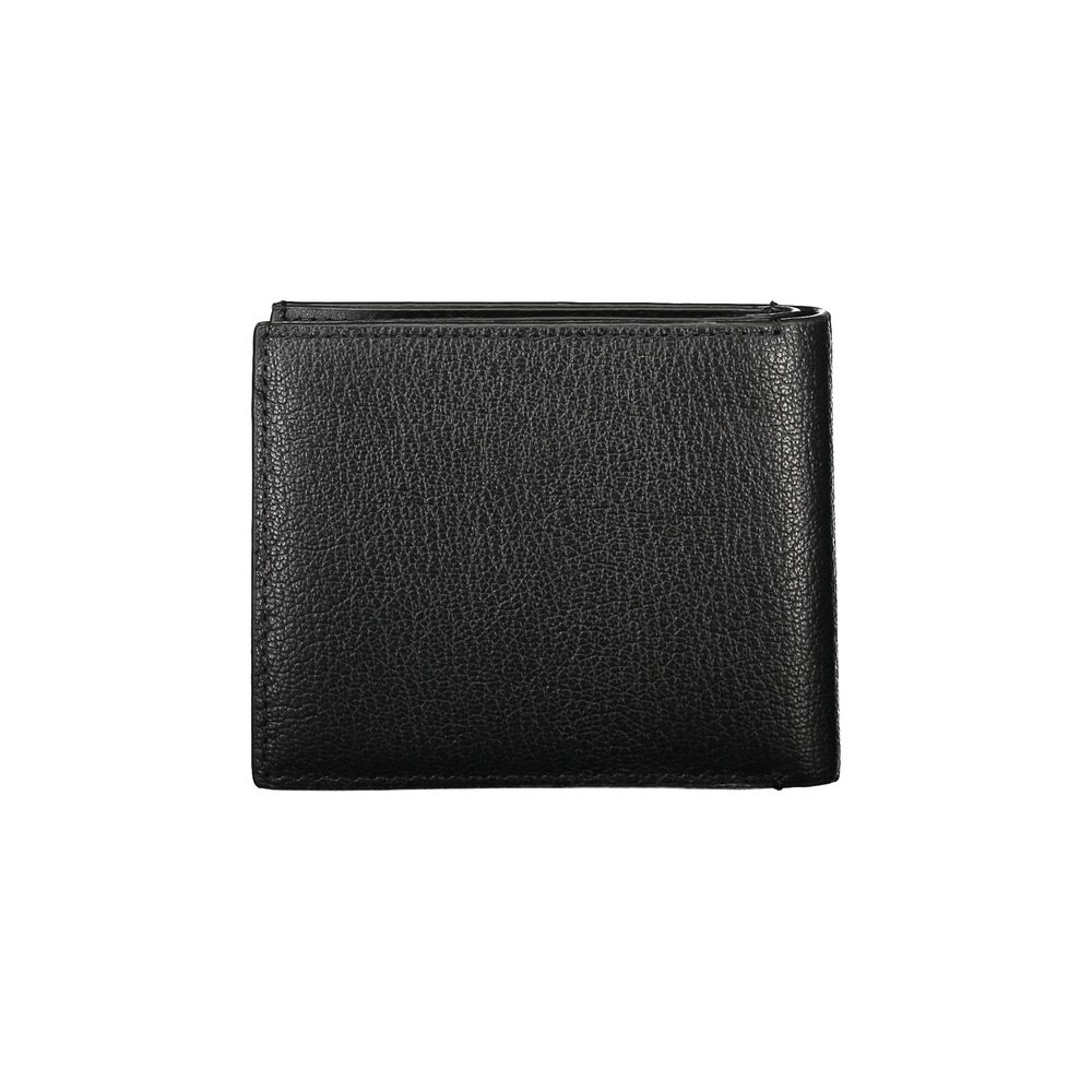 Cardholder Wallet by Calvin Klein for men in leather black showcases a refined silhouette, artfully detailed with the signature style of the Leather Cardholder Wallet and functional card-organization rfid-protection coin-purse.
