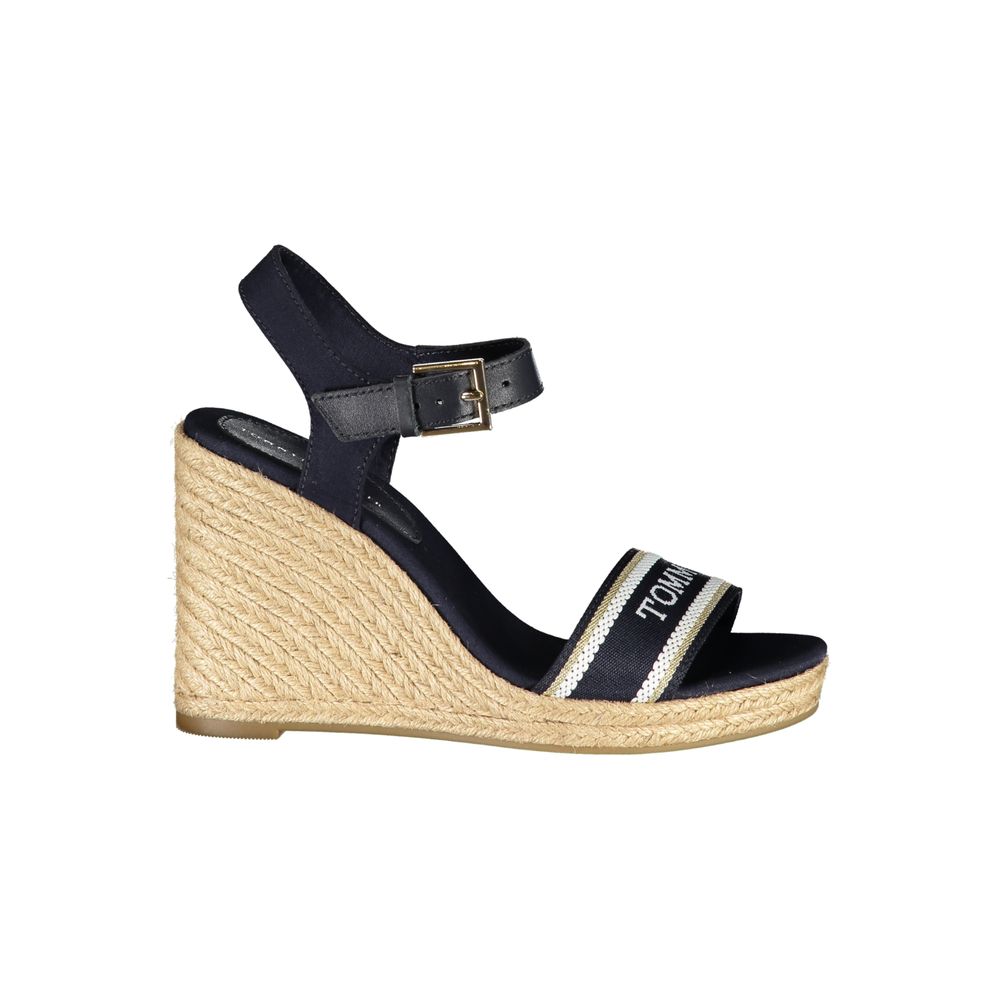 Wedge Sandals by Tommy Hilfiger for women in polyester polyurethane leather blue features an architectural design from the Women's Polyester Polyurethane Leather Wedge Sandals collection, defined by a architectural wedge and for a architectural finish.