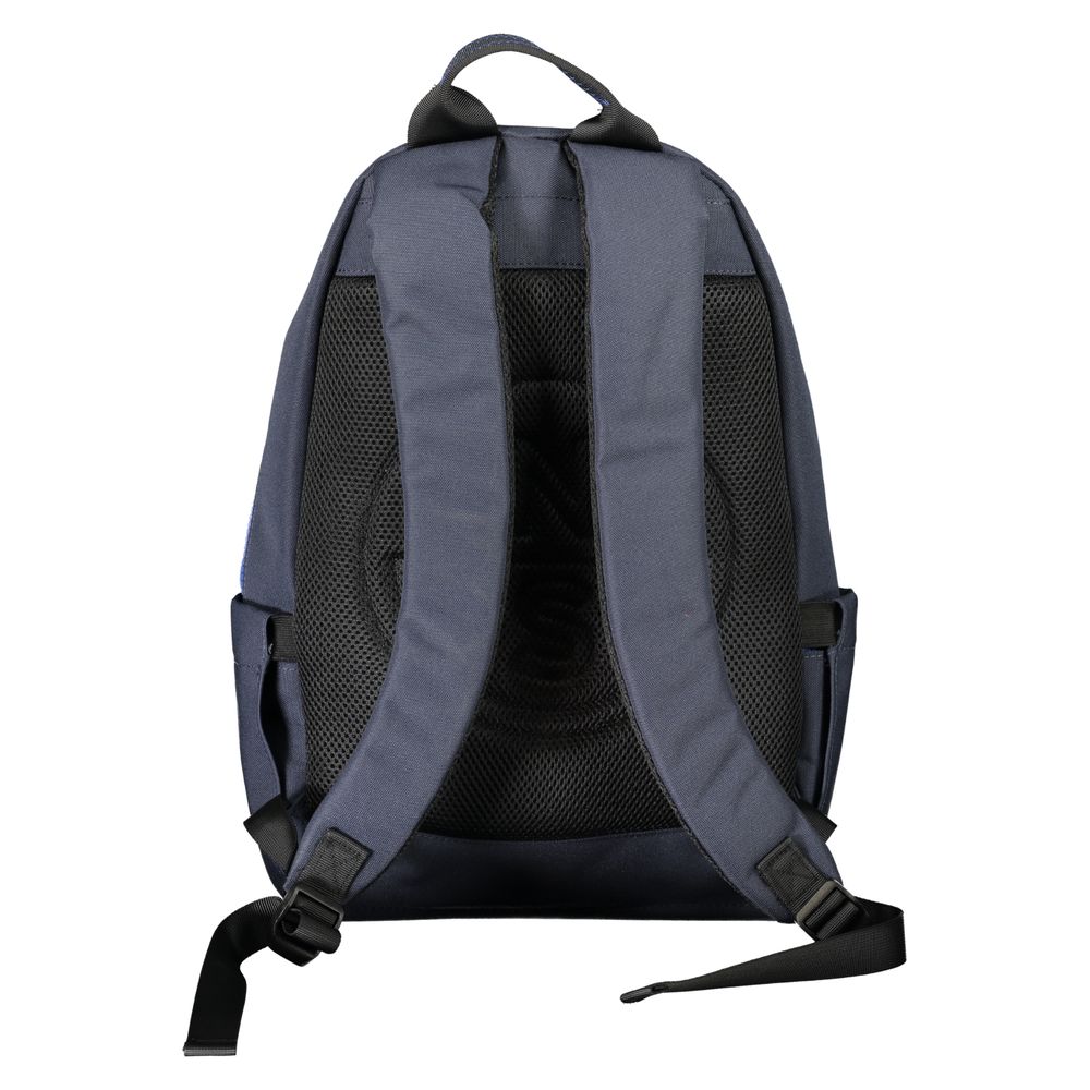 Backpack by North Sails for men in polyester blue showcases an architectural Explorer Polyester Backpack design, featuring a secure zipper, ample external-pockets & laptop-compartment, and architectural backpack-strap & adjustable-strap for a sophisticated look.