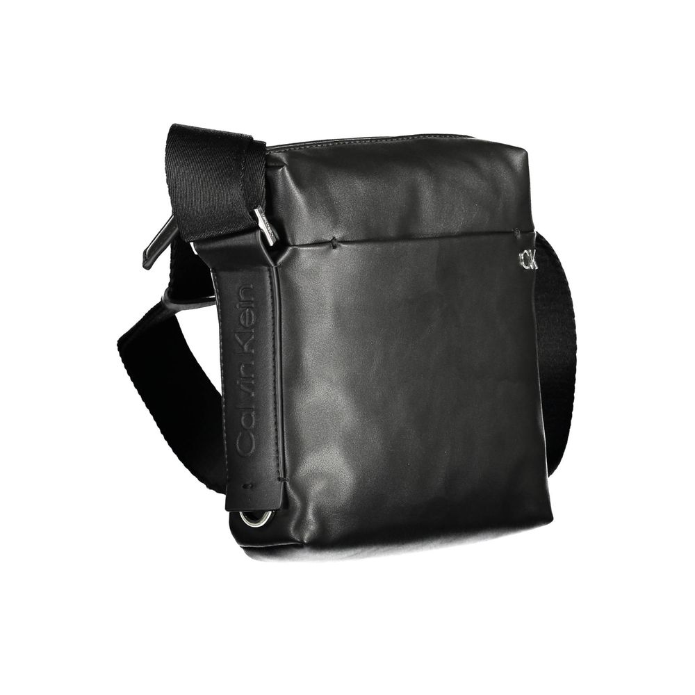 Shoulder Bag by Calvin Klein for men in polyester & polyethylene black & signature showcases a statuesque silhouette, artfully detailed with a secure zipper, organized external-pockets, and versatile shoulder-strap & adjustable-strap for a statuesque look.