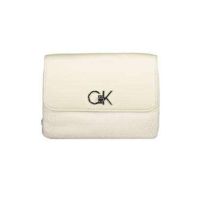 Crossbody Convertible Handbag by Calvin Klein for women in polyester beige features an exquisite silhouette, showcasing a secure , ample built-in-compartments & cardholder, and versatile crossbody-strap, adjustable-strap & handle for exquisite style.