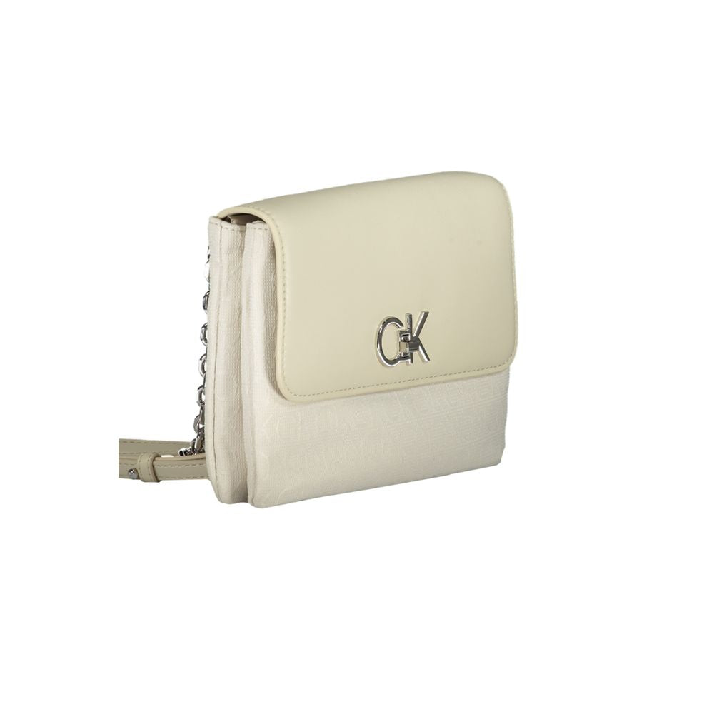 Crossbody Convertible Handbag by Calvin Klein for women in polyester beige features a polished silhouette with a secure , ample built-in-compartments & cardholder, and polished crossbody-strap, adjustable-strap & handle for a sophisticated look.
