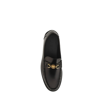 Loafer Shoes by Versace for men in bos taurus calf leather black features an ergonomic silhouette, perfectly showcasing Medusa Men's Bos Taurus Calf Leather Loafer Shoes with its distinct block-heel and elegant round toe style.