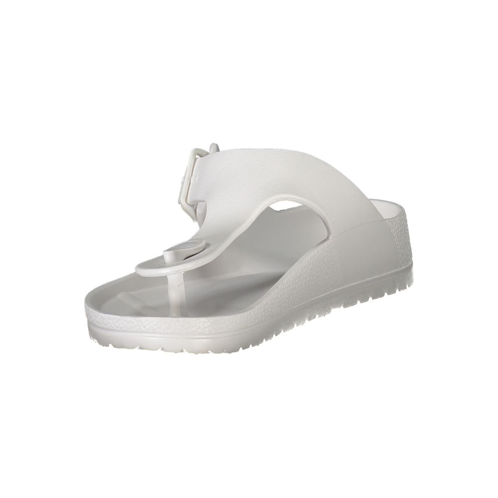 Flip-Flop Sandals by Norway 1963 for women in plastic white & print showcases a sculptural silhouette as Women's Plastic Flip-Flop Sandals, defined by a sculptural and sculptural for a sculptural look.