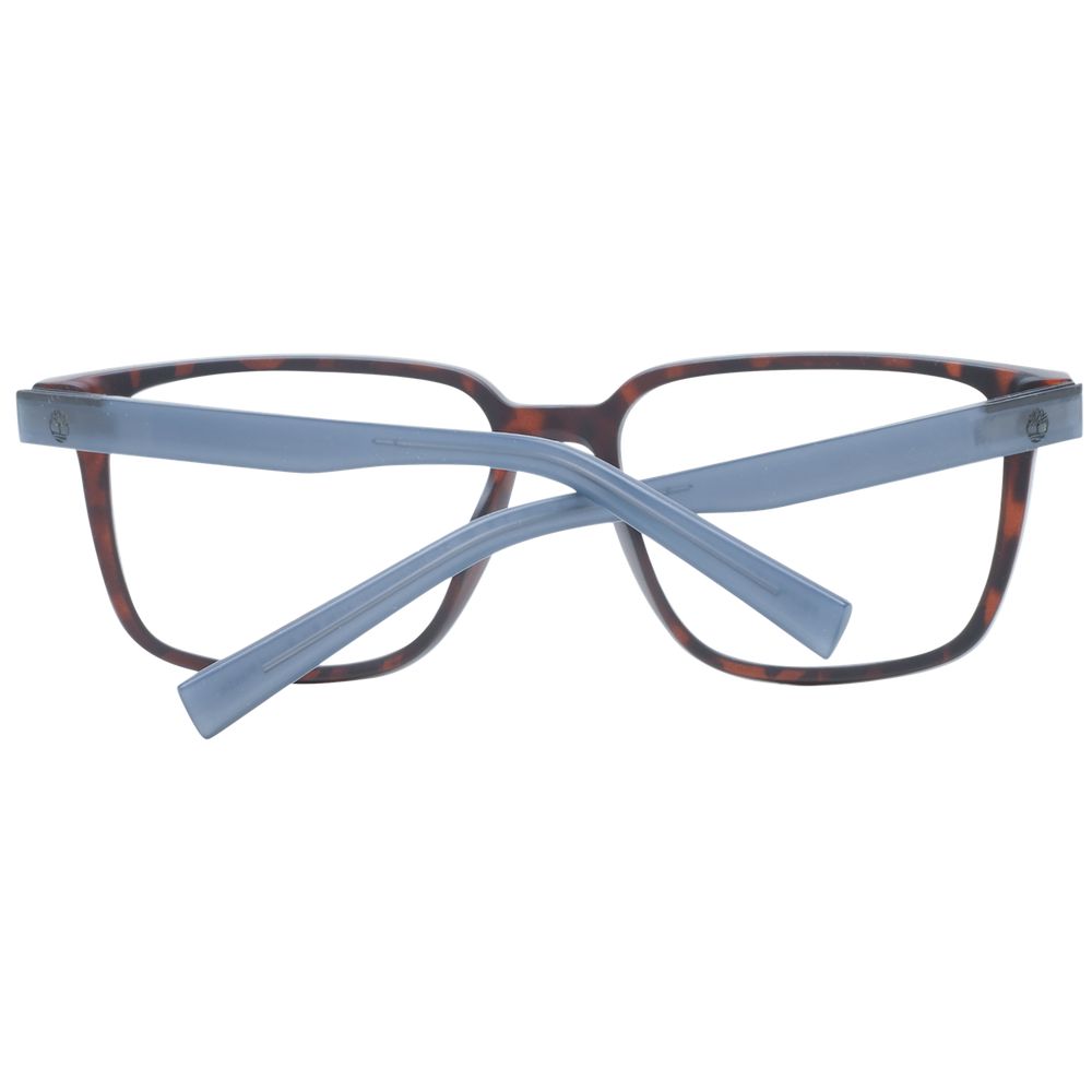 Eyeglasses Frames by Marciano by Guess for women in brown showcases a reflective silhouette, artfully incorporating a sophisticated brown coloured frame with a distinct full-frame frame design.