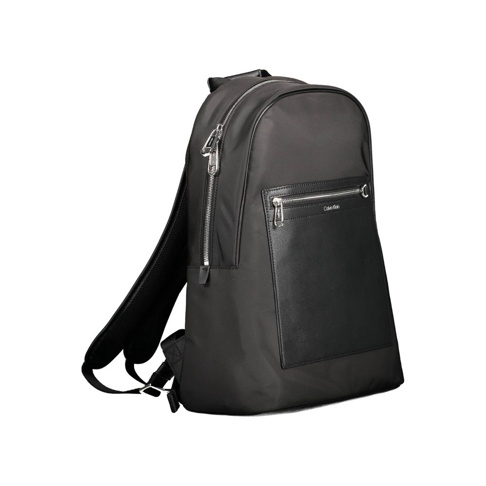 Backpack by Calvin Klein for men in polyester black features a refined silhouette, showcasing the Polyester Backpack design with a secure zipper, ample external-pockets, internal-pockets & laptop-compartment, and versatile handle, backpack-strap & adjustable-strap.