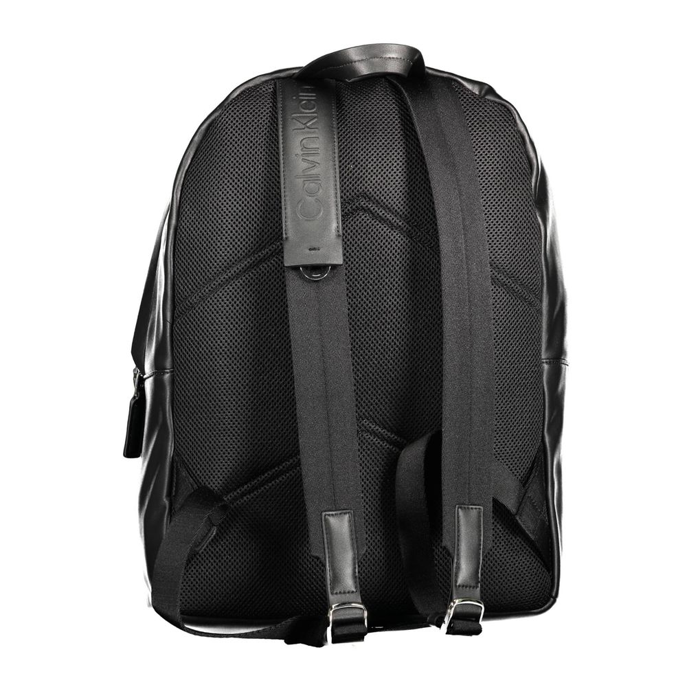 Backpack by Calvin Klein for men in polyester black features an stately silhouette from the Polyester Backpack range, with a secure zipper, ample external-pockets, internal-pockets & laptop-compartment, and versatile backpack-strap, adjustable-strap & handle.