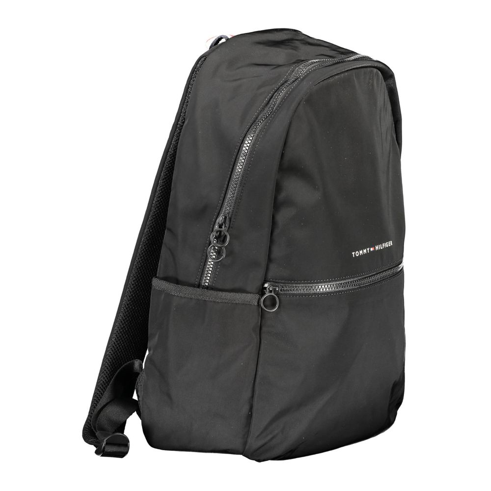 Backpack by Tommy Hilfiger for men in polyester black & signature features a architectural Polyester Backpack design with a secure zipper, ample external-pockets, internal-pockets & laptop-compartment, and versatile handle, backpack-strap & adjustable-strap for a architectural finish.